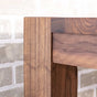 corner detail of a Walnut table 36