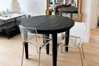 round black oak extendable table with 4 leaves