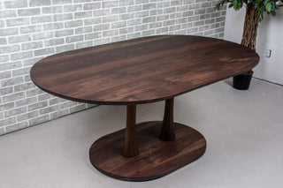 blackened walnut double pedestal oval table
