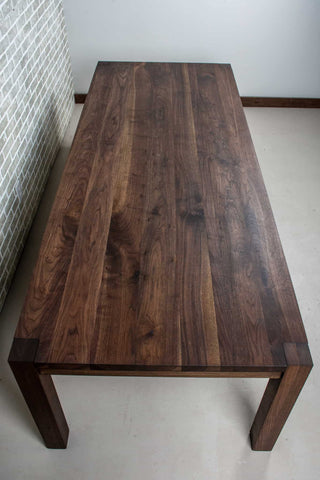 blackened walnut exposed leg parsons table