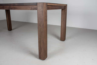 blackened walnut extendable table on modern exposed parsons base