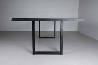 live edge ash table finished in black on square steel legs