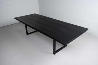 live edge ash table finished in black on square steel legs