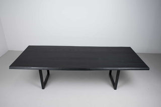 live edge ash table finished in black on square steel legs