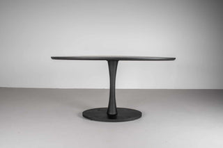 black oval table in ash wood on pedestal base