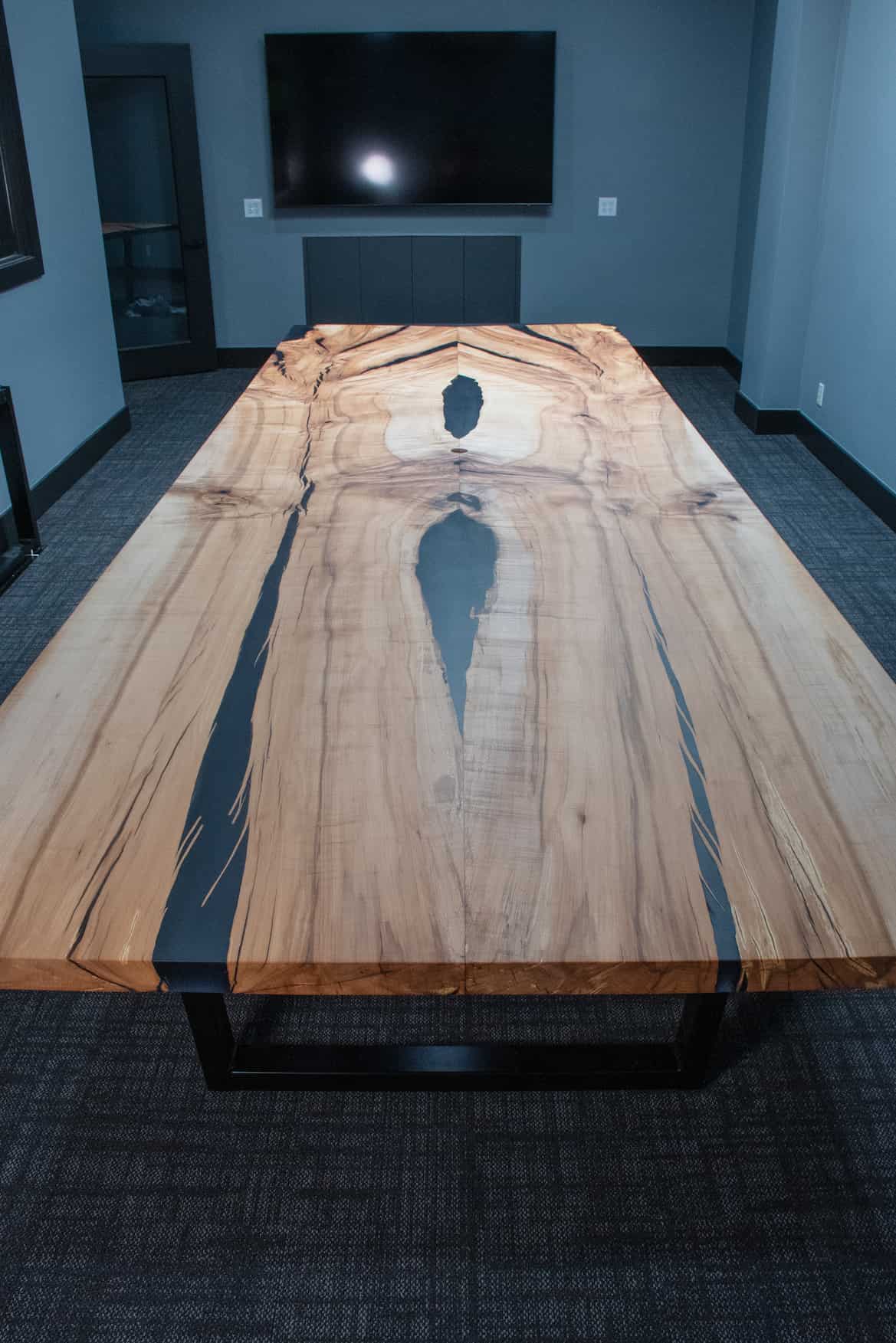 squoval shaped walnut conference table