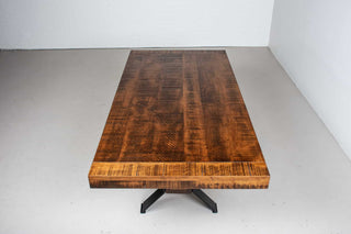 rustic maple dining table in cinnamon on industrial cross base with wood beam