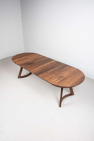 expandable oval walnut dining table