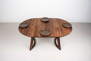 mid century modern oval extendable table in walnut on modern legs