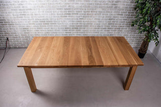 extendable oak dining table on parsons base