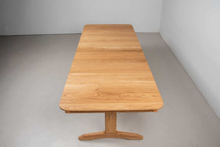extendable solid oak dining table on matching tobin legs
