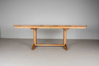 extendable oak dining table on traditional trestle base