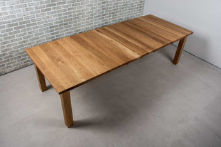 extendable oak dining table on parsons base