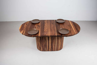 extendable oval table in walnut on a fluted walnut pedestal base