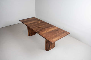 walnut extendable table on midcentury modern fluted legs