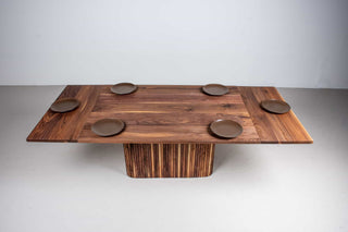 extendable walnut table on fluted pedestal base