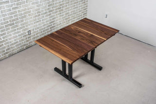 extendable kitchen table in walnut on steel tuttle legs