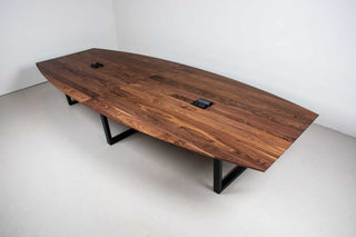 large squoval shaped walnut conference table