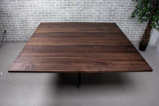 large square walnut table on starburst base
