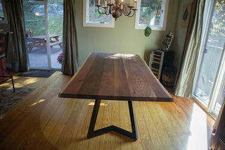 live edge walnut table on steel chevron legs