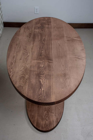 maple elliptical oval table in coconut on pedestal base