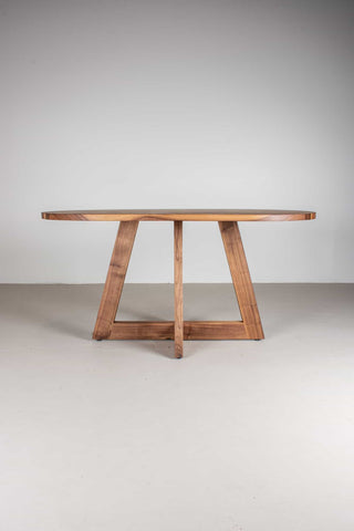 mid century oval table in walnut on single cross pedestal base