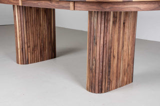 mid century extendable oval table on fluted walnut legs