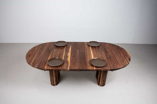 mid century extendable oval table on fluted walnut legs