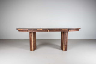 mid century extendable oval table on fluted walnut legs