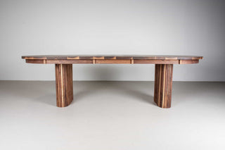 mid century extendable oval table on fluted walnut legs