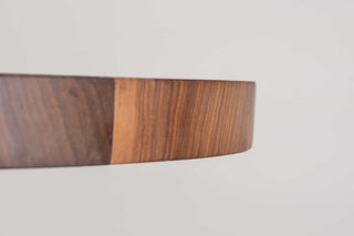 mid century oval table in walnut on single cross pedestal base