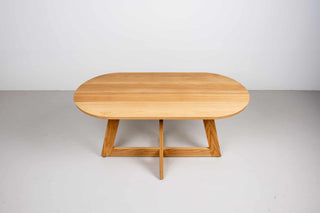 natural oak racetrack oval table on moraine pedestal base