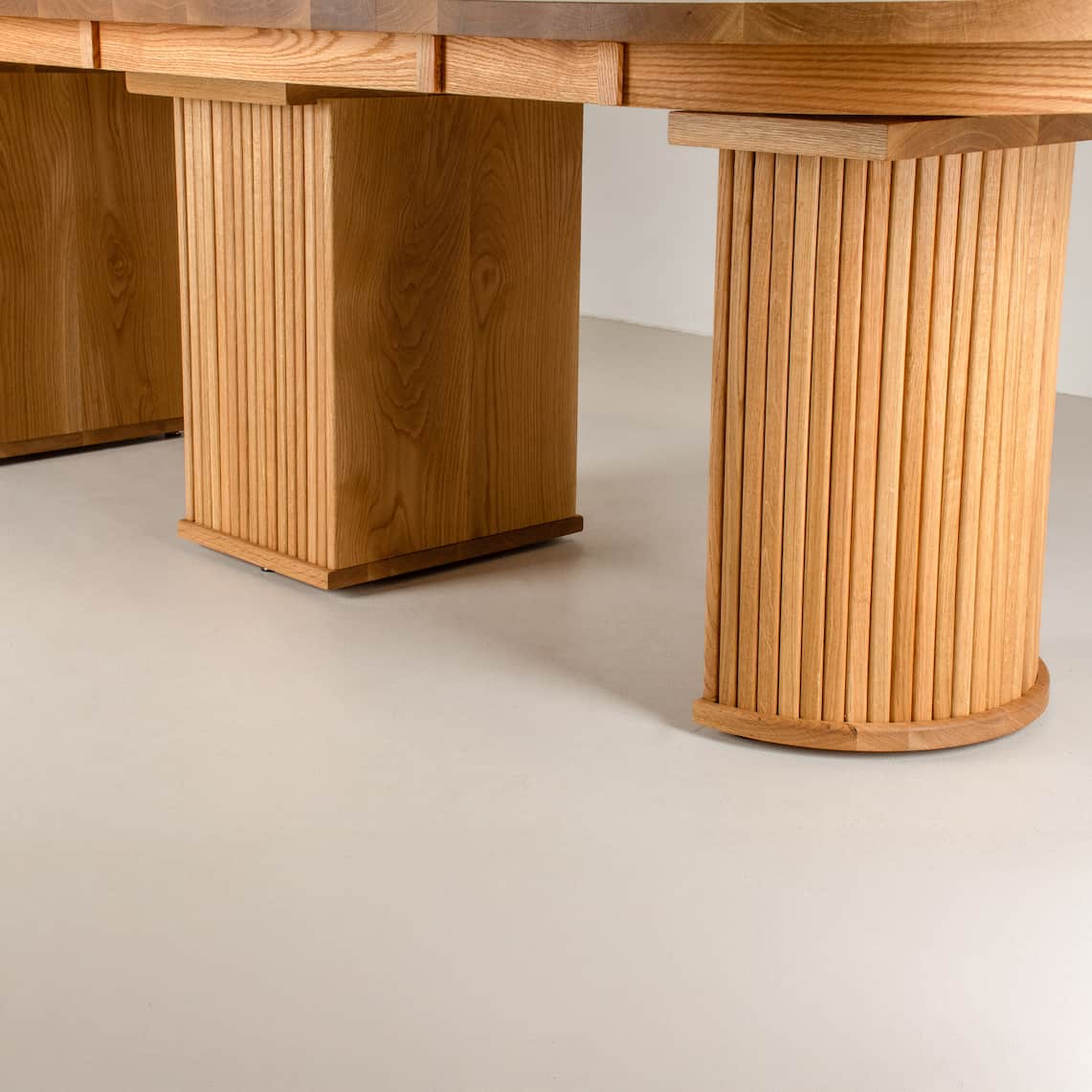 Extendable wooden table with 3 part base 