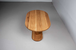 oak racetrack oval table on pedestal base