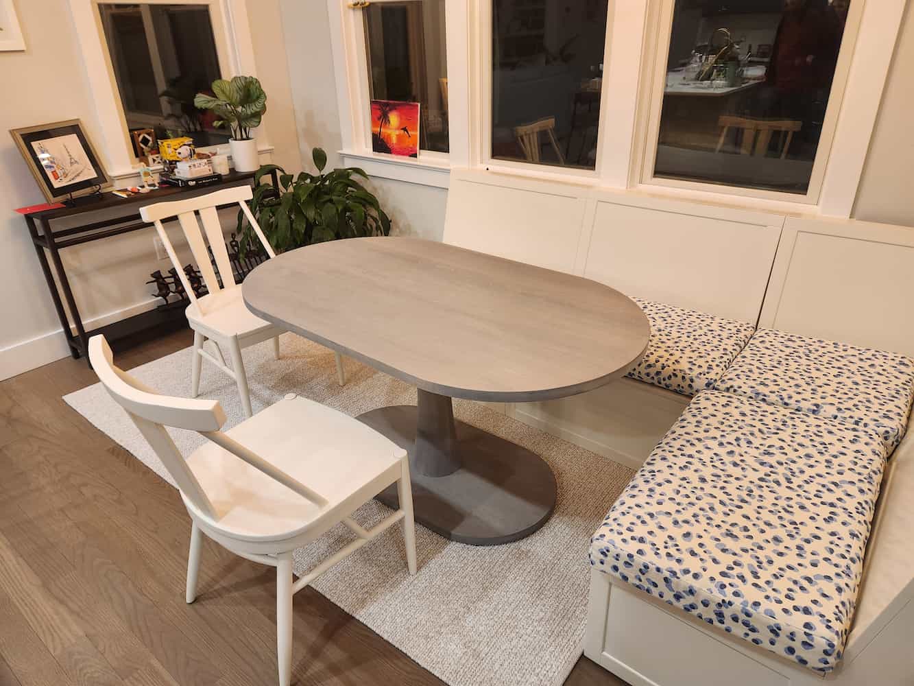 oval ash pedestal table for a kitchen nook