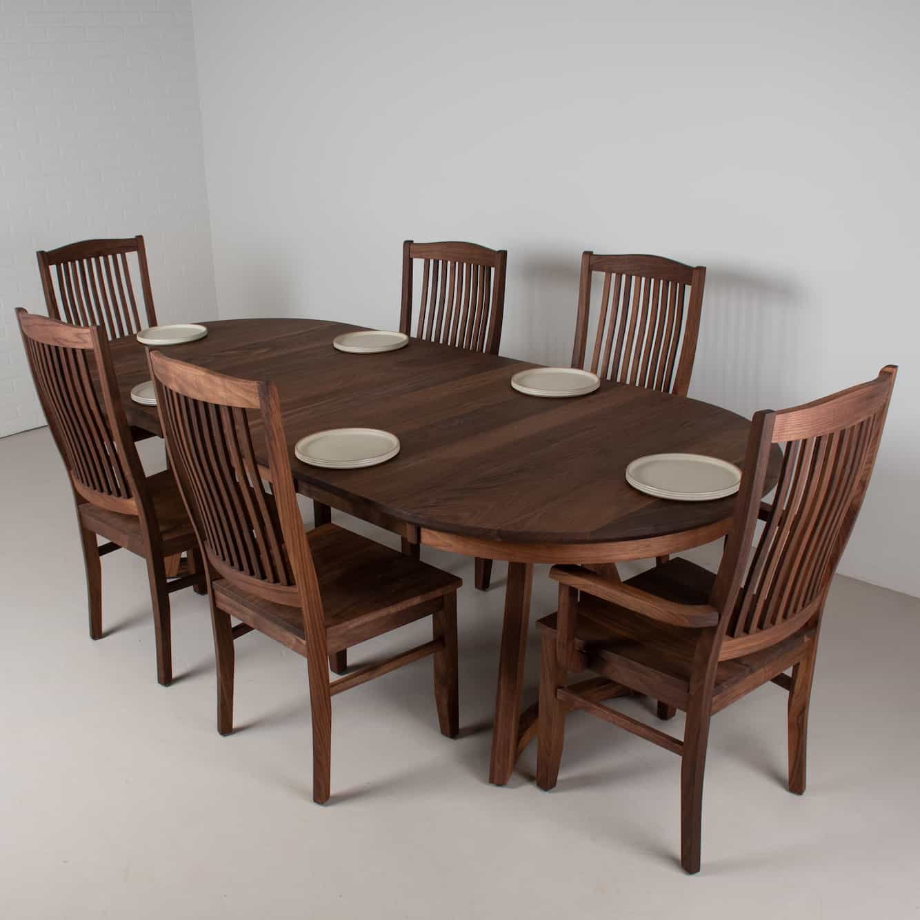 oval wood table with chairs