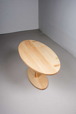 oval oak table on pedestal base