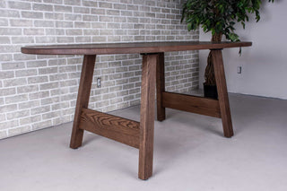 oval oak table on wood legs all finished in espresso