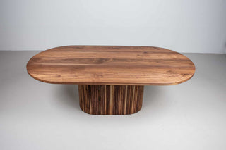 racetrack oval walnut dining table on fluted pedestal base