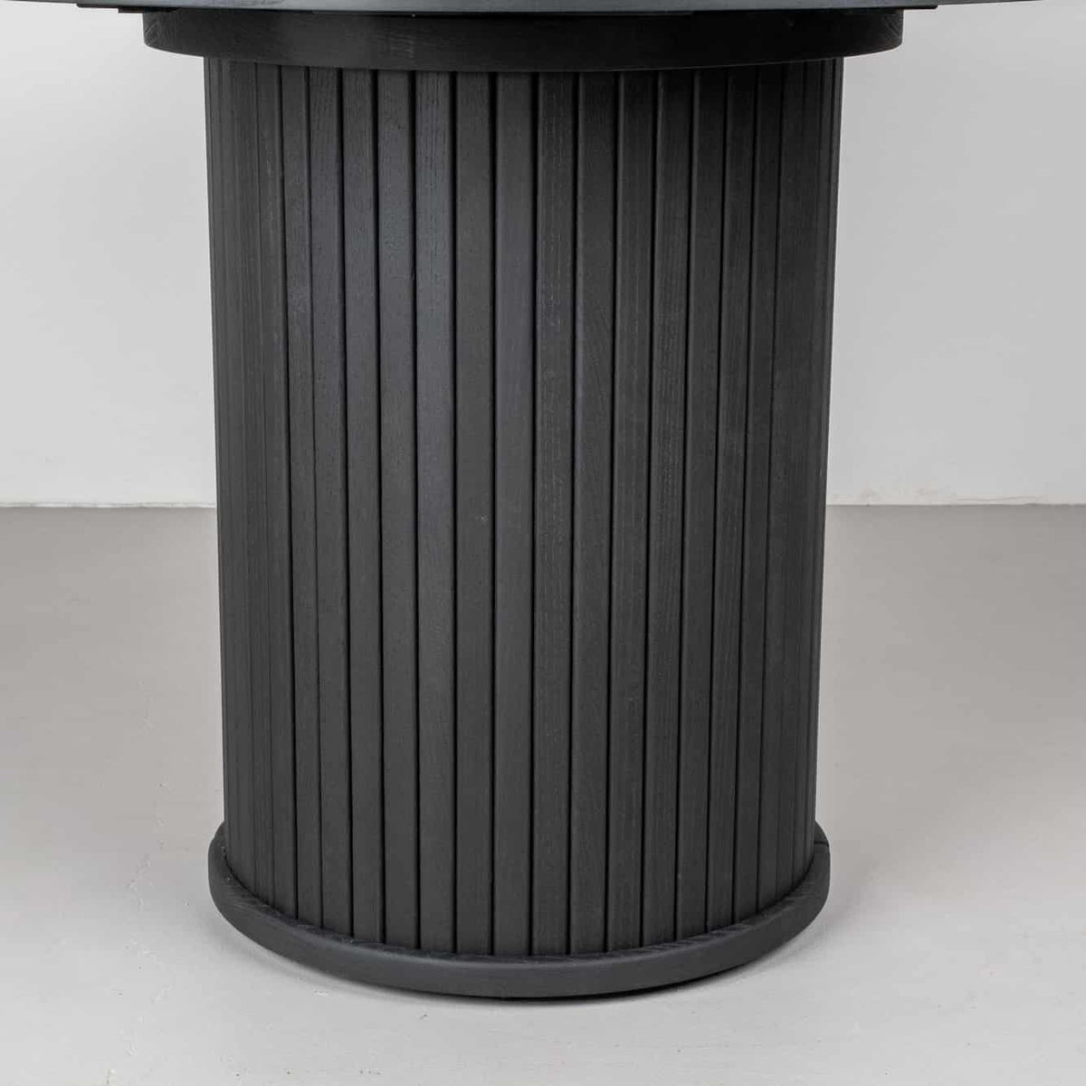 a fluted Ash base finished in Black