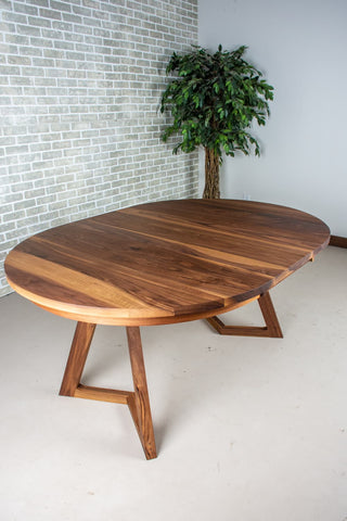 round walnut center extension table on wood caldwell legs