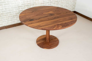 round walnut table on jennings pedestal base