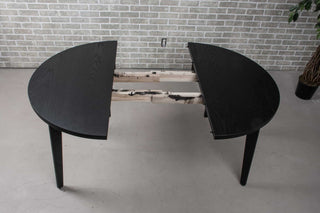 round oak extendable table on midcentury base