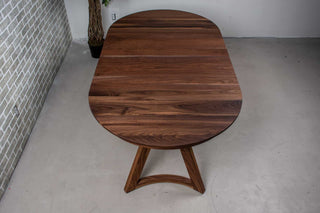 round walnut extendable table on chesboro legs