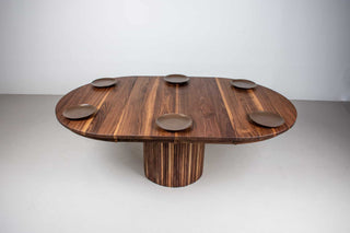 round walnut extendable table on mid century fluted pedestal base