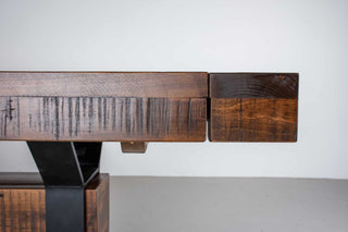 rustic wood table on industrial beam base