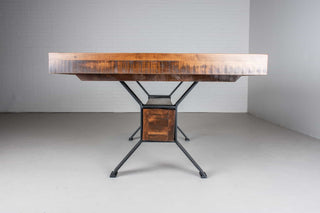 rustic wood table on industrial beam base
