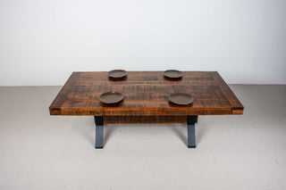 rustic wood table on industrial beam base