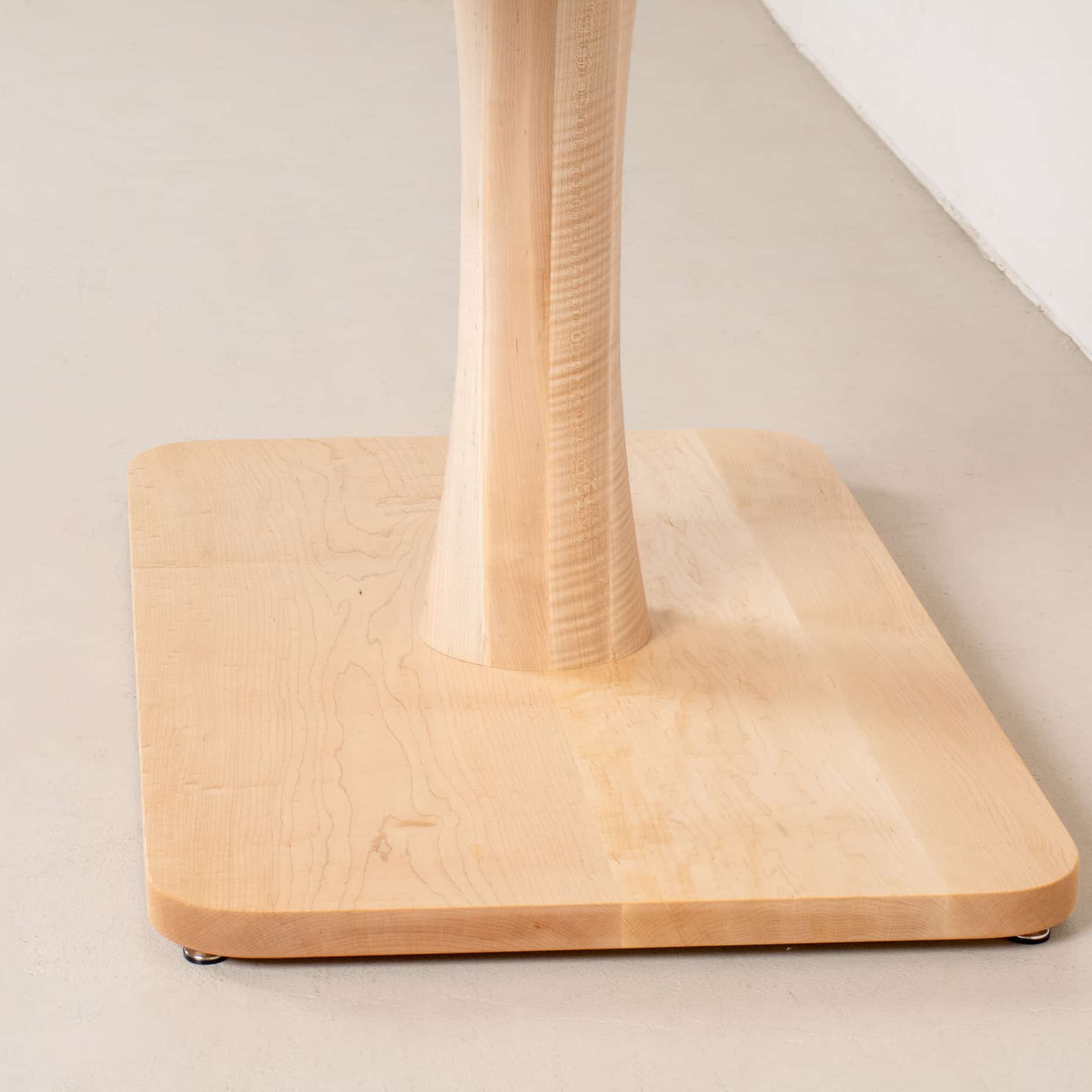 close up of maple pedestal base for a table