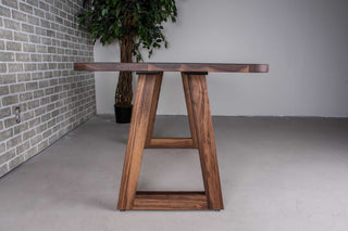 small walnut dining table on walnut angle legs